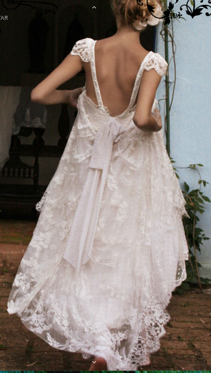  Brazilian designer who makes elegant openbacked lace wedding dresses